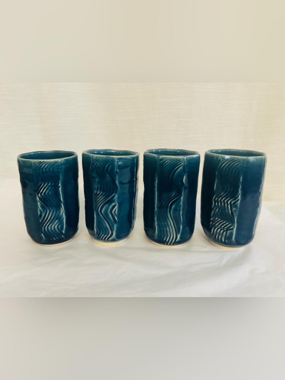 Set‎ of Four Signed Handmade Ceramic Tumblers with Artistic Detail and Glazing